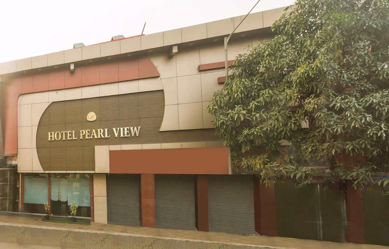 Capital O Hotel Pearl Near Us Embassy Bombaim Exterior foto